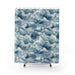 Shower curtain that features a watercolor wave pattern.