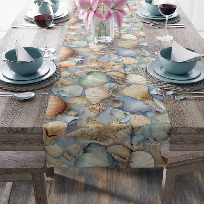 Table runner with a watercolor sea shell pattern. Available in 2 sizes.