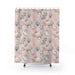 Shower curtain that features a seashell and coral pattern on a pink background.