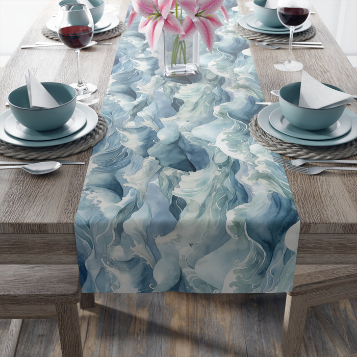Table runner that features a watercolor wave pattern. Available in 2 sizes.