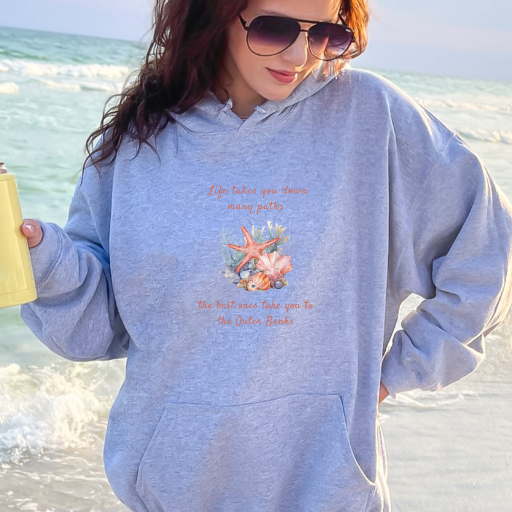 Hoodie that says "Life takes you down many paths, the best ones lead to the Outer Banks. Avaliable in a variety of colors and sizes.