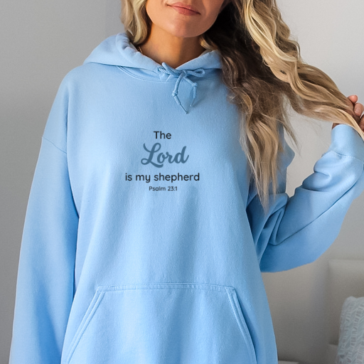 Discover our 'The Lord is my Shepherd. Psalm 23' Hoodie. Classic fit, cozy fabric, and a meaningful message. Ethically made with 100% US cotton. Available in various colors and sizes. Stay warm in style!